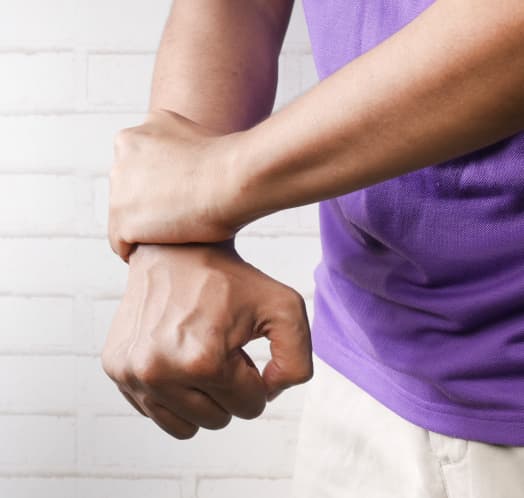 person holding wrist