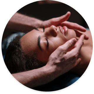 person getting face massaged