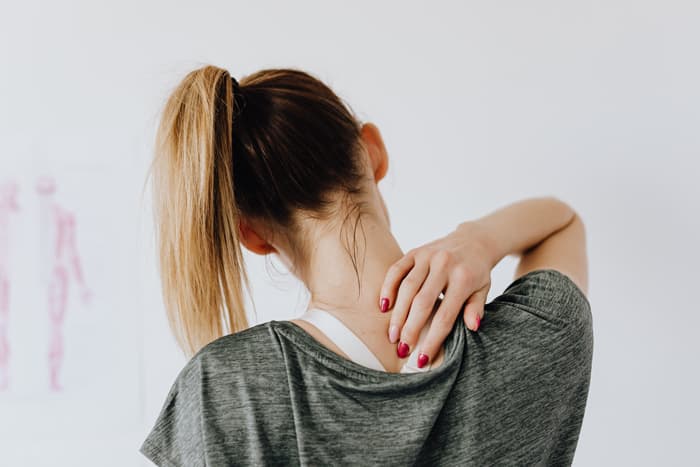 person stretching neck
